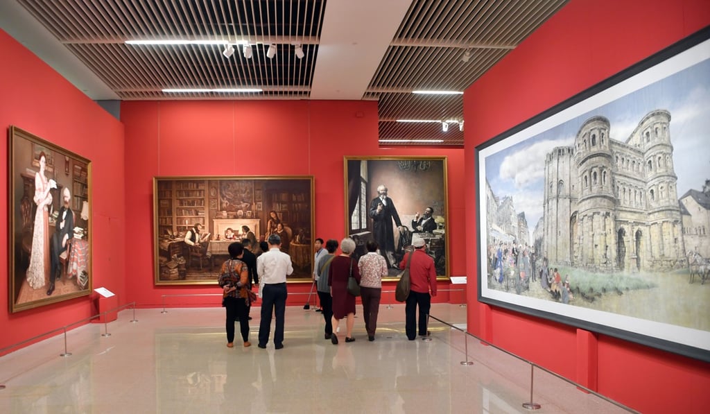 People look at Marxism-themed contemporary art pieces displayed at ‘The Power of Truth’, an exhibition marking the 200th anniversary of Karl Marx's birth, at the National Museum of China in Beijing. Photo: Xinhua