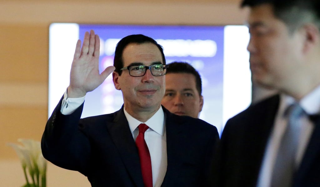 US Treasury Secretary Steven Mnuchin waves as he and members of the US trade delegation leave a hotel in Beijing, on May 3. Photo: Reuters