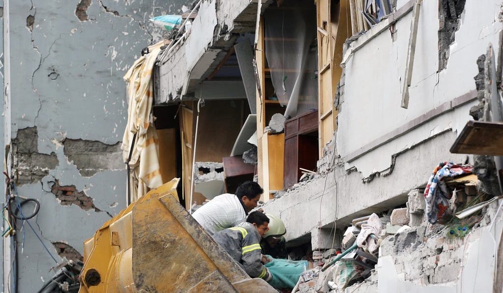 Zhang Xiaoyan being rescued from her collapsed home in Dujiangyan on May 14, 2008. Photo: Robert Ng