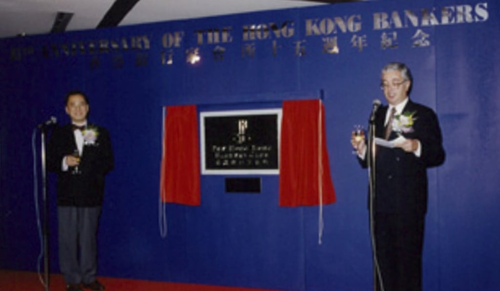 Donald Tsang, (left) and Georges Legros lead a toast to mark the 15th anniversary of Hong Kong Bankers Club in 1996, when its name was changed from The Hong Kong Overseas Bankers Club. Photo: The Hong Kong Bankers Club
