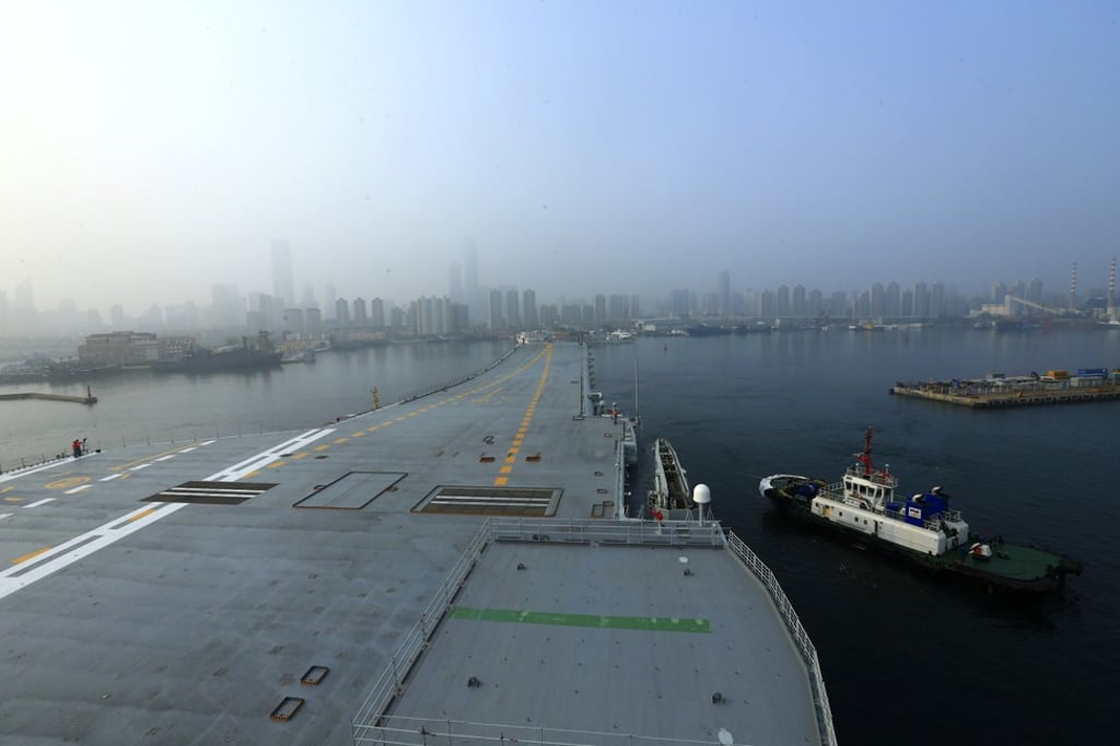 The warship sailed out of Dalian early on Sunday in heavy fog to test its power and propulsion systems. Photo: Xinhua via AP
