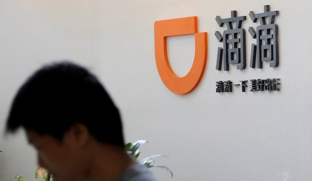 The logo of Didi Chuxing is seen at its headquarters in Beijing, China. Photo: Reuters