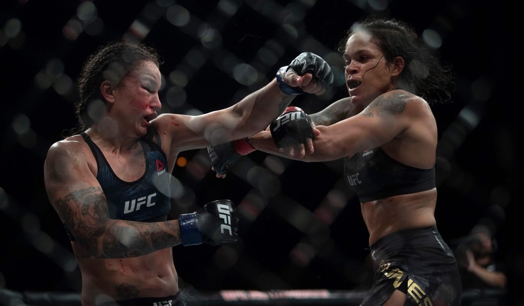 Raquel Pennington (left) fought gamely in her defeat to Amanda Nunes. Photo: AFP Raquel Pennington (left) fought gamely in her defeat to Amanda Nunes. Photo: AFP