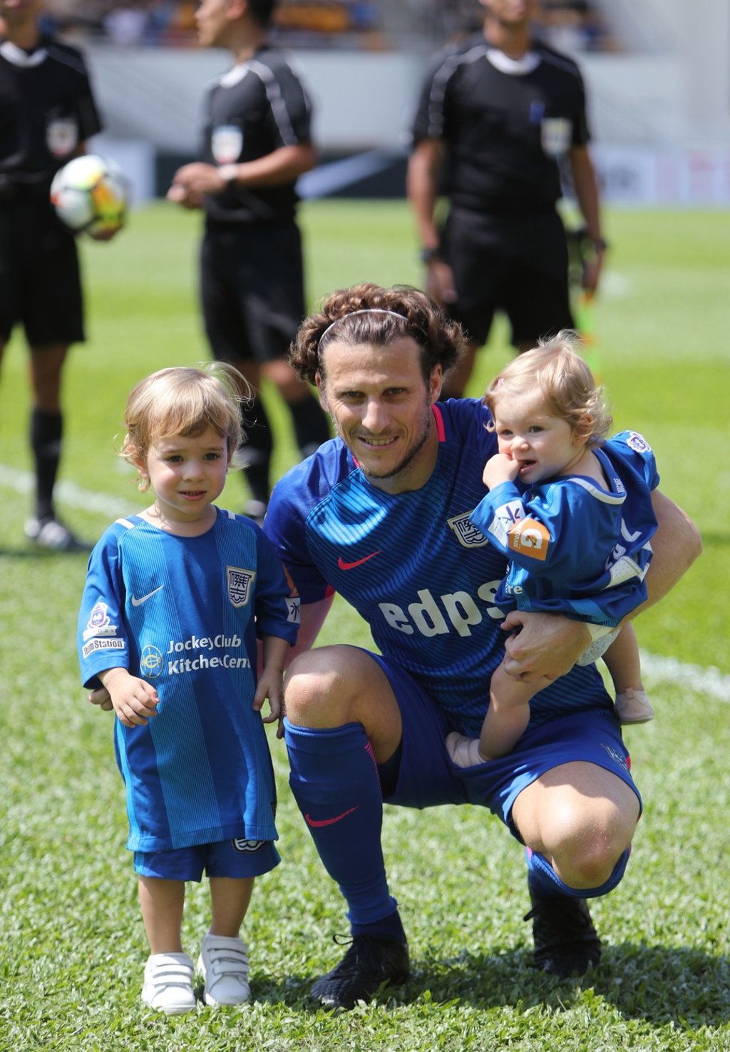 Diego Forlan with his two children as he bids goodbye to Hong Kong with champions Kitchee against Yuen Long in the Premier League, at Mong Kok Stadium. Photo: Winson Wong