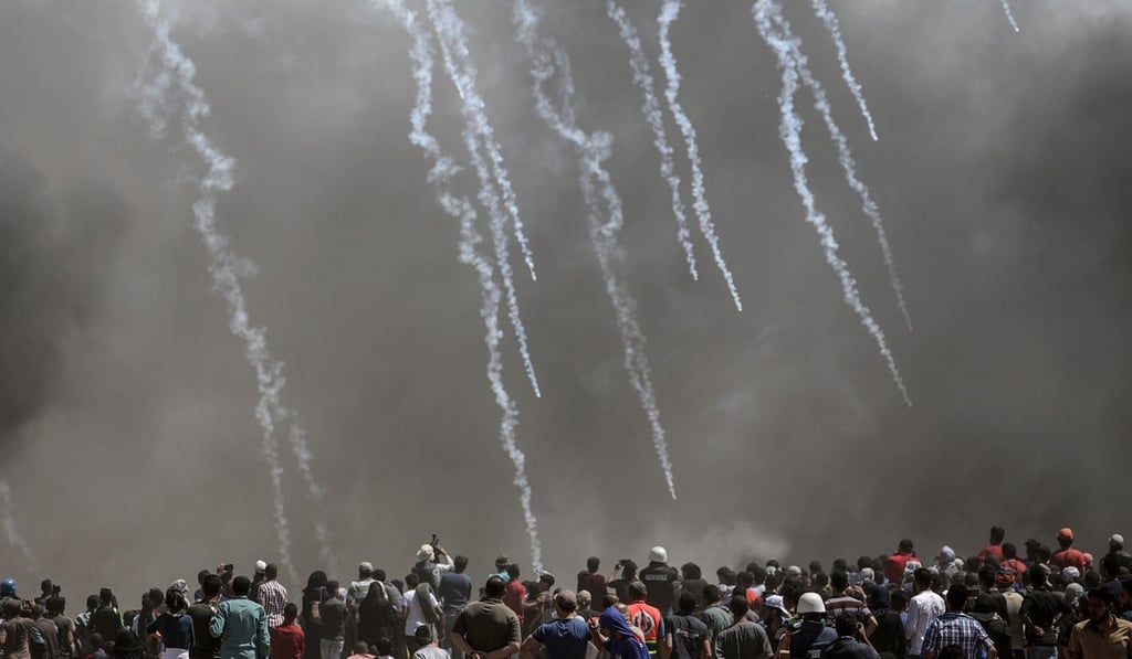 Palestinians protesters run for cover from Israeli tear-gas during clashes near the border with Israel in the east of Gaza Strip on Monday, Photo: EPA5 May 1948. Protesters call for the right of Palestinians to return to their homeland. EPA-EFE/MOHAMMED SABER Palestinians protesters run for cover from Israeli tear-gas during clashes near the border with Israel in the east of Gaza Strip on Monday, Photo: EPA5 May 1948. Protesters call for the right of Palestinians to return to their homeland. EPA-EFE/MOHAMMED SABER