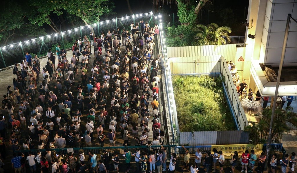People queue up to vote in the 2016 Legislative Council election at Lam Tin. Photo: Sam Tsang