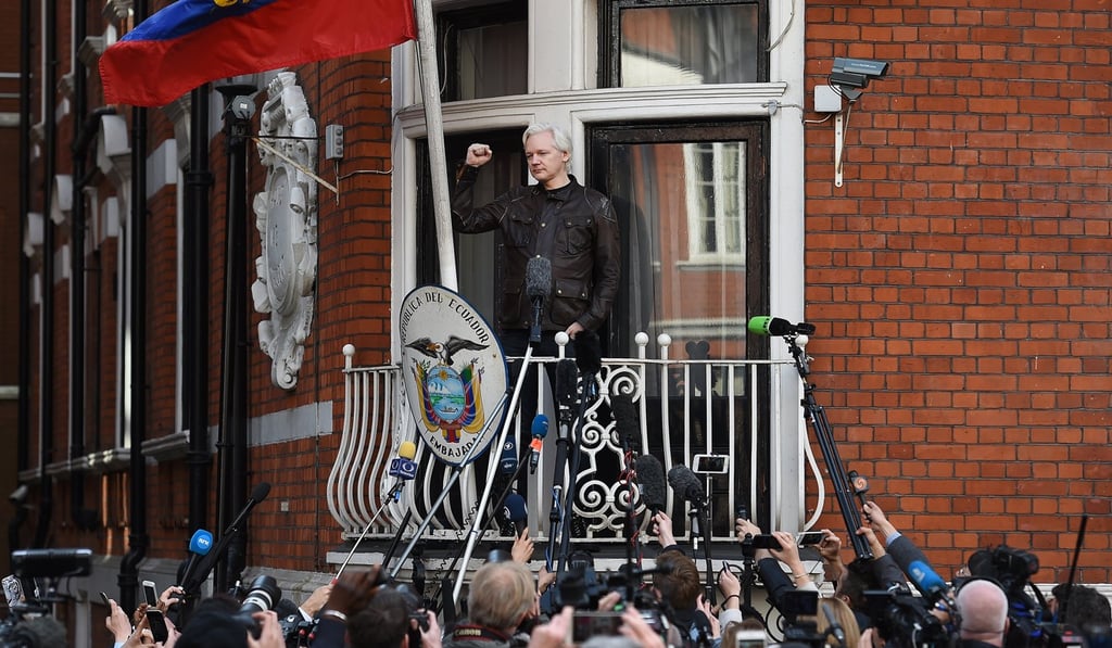 Julian Assange speaks to the media from the balcony of the Ecuadorean Embassy in London on May 19, 2017. Photo: EPA