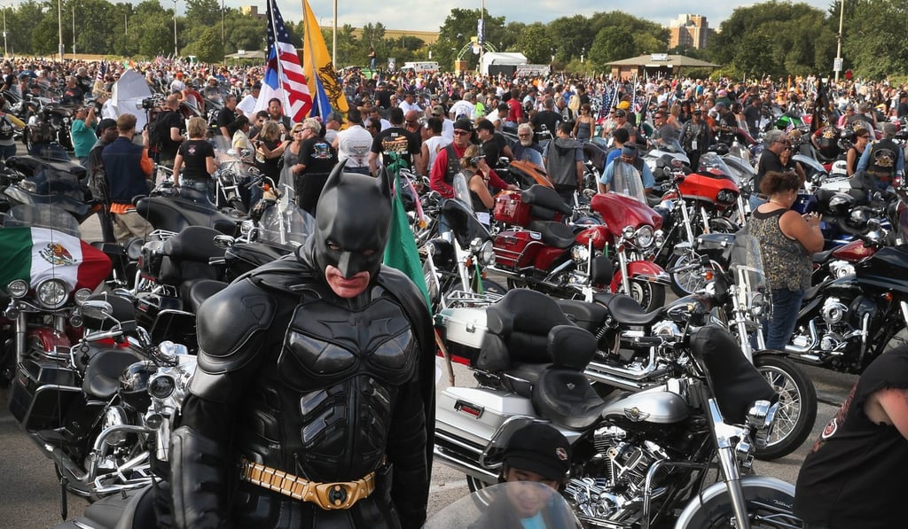 Motorcycle enthusiasts gather in a car park at Miller Park beforeriding in a parade through downtown to celebrate Harley-Davidson's 110th anniversary on August 31, 2013 in Milwaukee, Wisconsin. Motorcycle tailpipes can be as loud as 125 decibels. Photo: Agence France-Presse