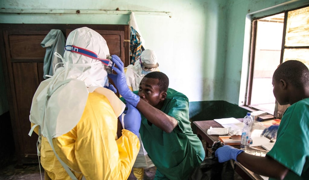 In this handout photograph released by Unicef, health workers wear protective equipment as they prepare to attend to suspected Ebola patients at Bikoro Hospital - the epicentre of the latest Ebola outbreak in the Democratic Republic of Congo on May 12. Photo: Agence France-Presse