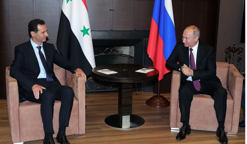Russian President Vladimir Putin (right) and Syrian President Bashar al-Assad (L) speak during their meeting in the Black sea resort of Sochi, Russia, on Thursday. Photo: EPA Russian President Vladimir Putin (right) and Syrian President Bashar al-Assad (L) speak during their meeting in the Black sea resort of Sochi, Russia, on Thursday. Photo: EPA