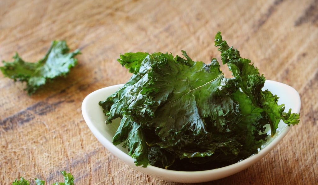 Make kale crisps at home with a pinch of salt and a dash of olive oil. Photo: Alamy
