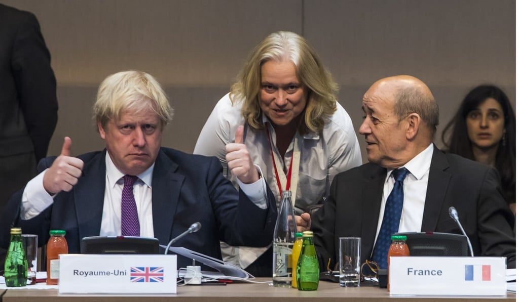 Johnson and French Foreign Affairs Minister Jean-Yves Le Drian during a meeting in Paris. Photo: EPA