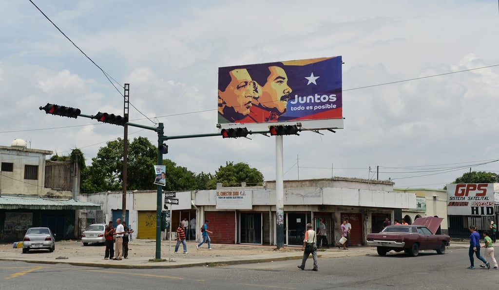 A billboard with Maduro and late president Hugo Chavez in Barquisimeto, Venezuela. Photo: AFP A billboard with Maduro and late president Hugo Chavez in Barquisimeto, Venezuela. Photo: AFP