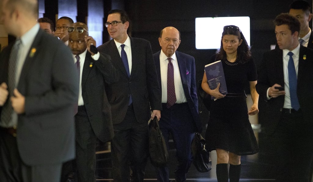 US Treasury Secretary Steven Mnuchin (centre left) and US Commerce Secretary Wilbur Ross (centre right) leave their hotel in Beijing for trade negotiations with Chinese officials on May 4. Photo: AP US Treasury Secretary Steven Mnuchin (centre left) and US Commerce Secretary Wilbur Ross (centre right) leave their hotel in Beijing for trade negotiations with Chinese officials on May 4. Photo: AP