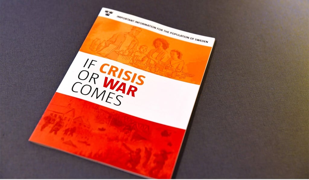 The new brochure “If Crisis or War Comes”, published by the Swedish Civil Contingencies Agency, is pictured during a press conference in Stockholm, on Monday. Photo: Agence France-Presse