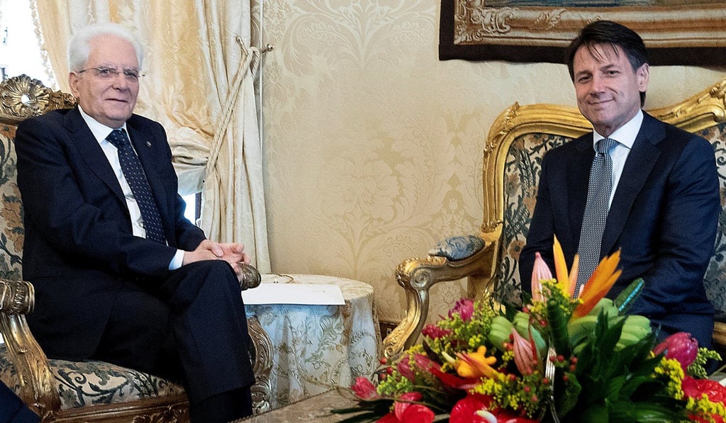Italian President Sergio Mattarella meets Giuseppe Conte at the Quirinale Palace in Rome, Italy on Wednesday. Photo: Italian Presidential Press Office handout via Reuters