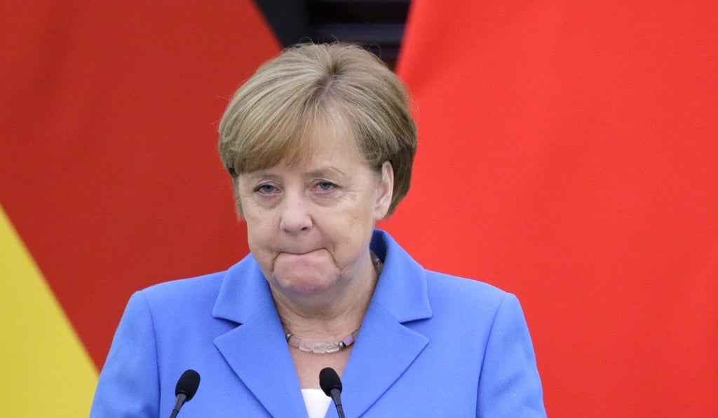 Angela Merkel said the two countries would sign a memorandum of understanding to work together on new auto technology. Photo: AFP