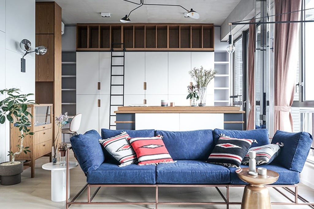 The Stephen Kenn sofa in the retro 1950s modernist flat designed by JAAK Studio.