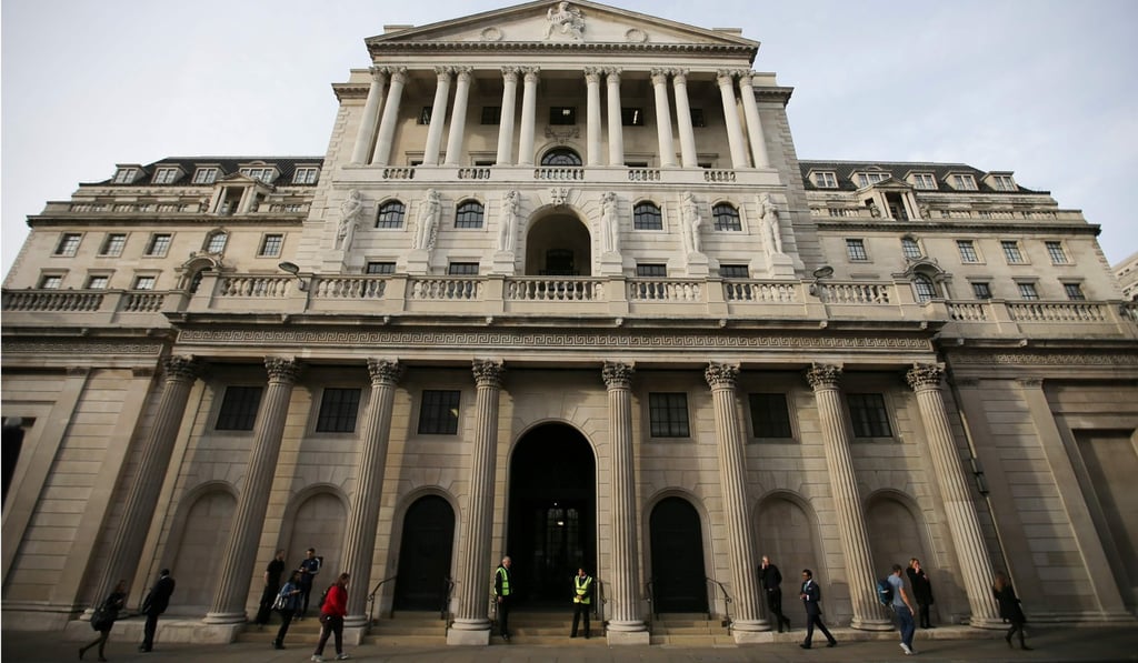 Pedestrians walk past the Bank of England in London in November 2017. The institution was one of the world’s first central banks. Photo: AFP