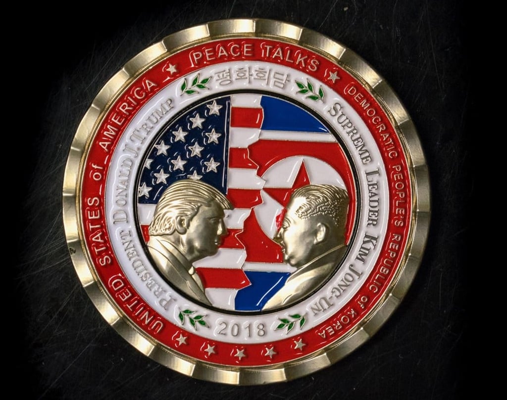 Another look at the commemorative coin featuring US President Donald Trump and North Korea's Kim Jong-un. Photo: Agence France-Presse Another look at the commemorative coin featuring US President Donald Trump and North Korea's Kim Jong-un. Photo: Agence France-Presse