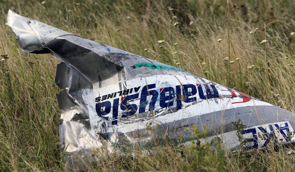 Part of the wreckage at the main crash site of the Boeing 777 Malaysia Airlines flight MH17, which crashed over the eastern Ukraine region. Photo: EPA Part of the wreckage at the main crash site of the Boeing 777 Malaysia Airlines flight MH17, which crashed over the eastern Ukraine region. Photo: EPA