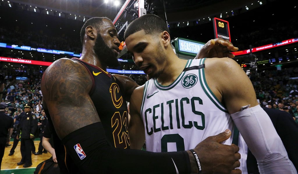 LeBron James embraces Boston Celtics forward Jayson Tatum after the Cleveland Cavaliers defeated the Boston Celtics in game seven. Photo: EPA LeBron James embraces Boston Celtics forward Jayson Tatum after the Cleveland Cavaliers defeated the Boston Celtics in game seven. Photo: EPA