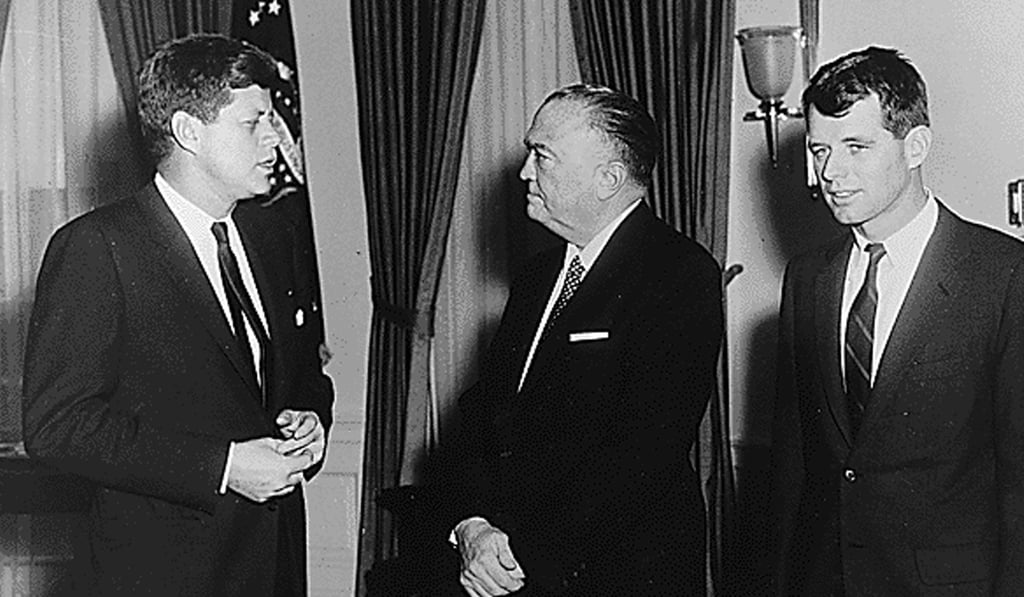 This February 23, 1961 photo obtained from the National Archives, shows then US President John F. Kennedy (left), FBI Director J. Edgar Hoover, and Attorney General Robert F. Kennedy in the Oval Office at the White House. Photo: Agence France-Presse