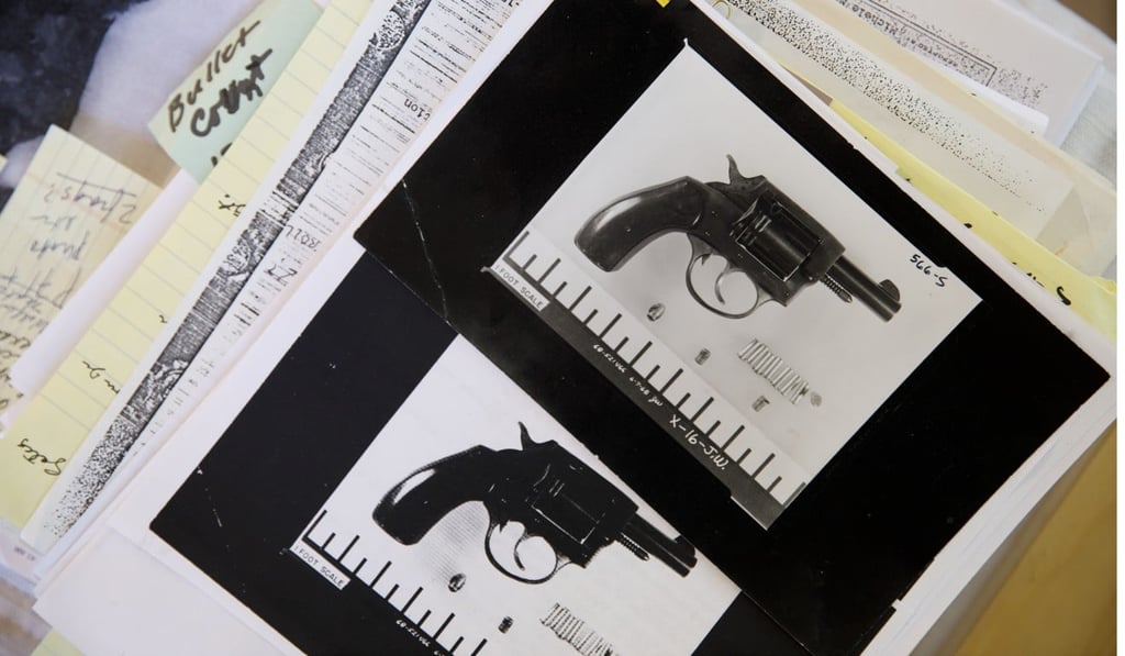 Evidence photographs of the gun used in the assassination plot to kill Robert F. Kennedy are displayed at Paul Schrade's Los Angeles home. Photo: The Washington Post
