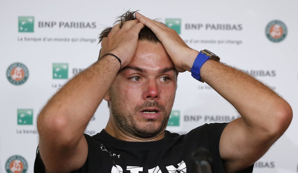Stan Wawrinka shows his frustration at the post-match press conference. Photo: AP
