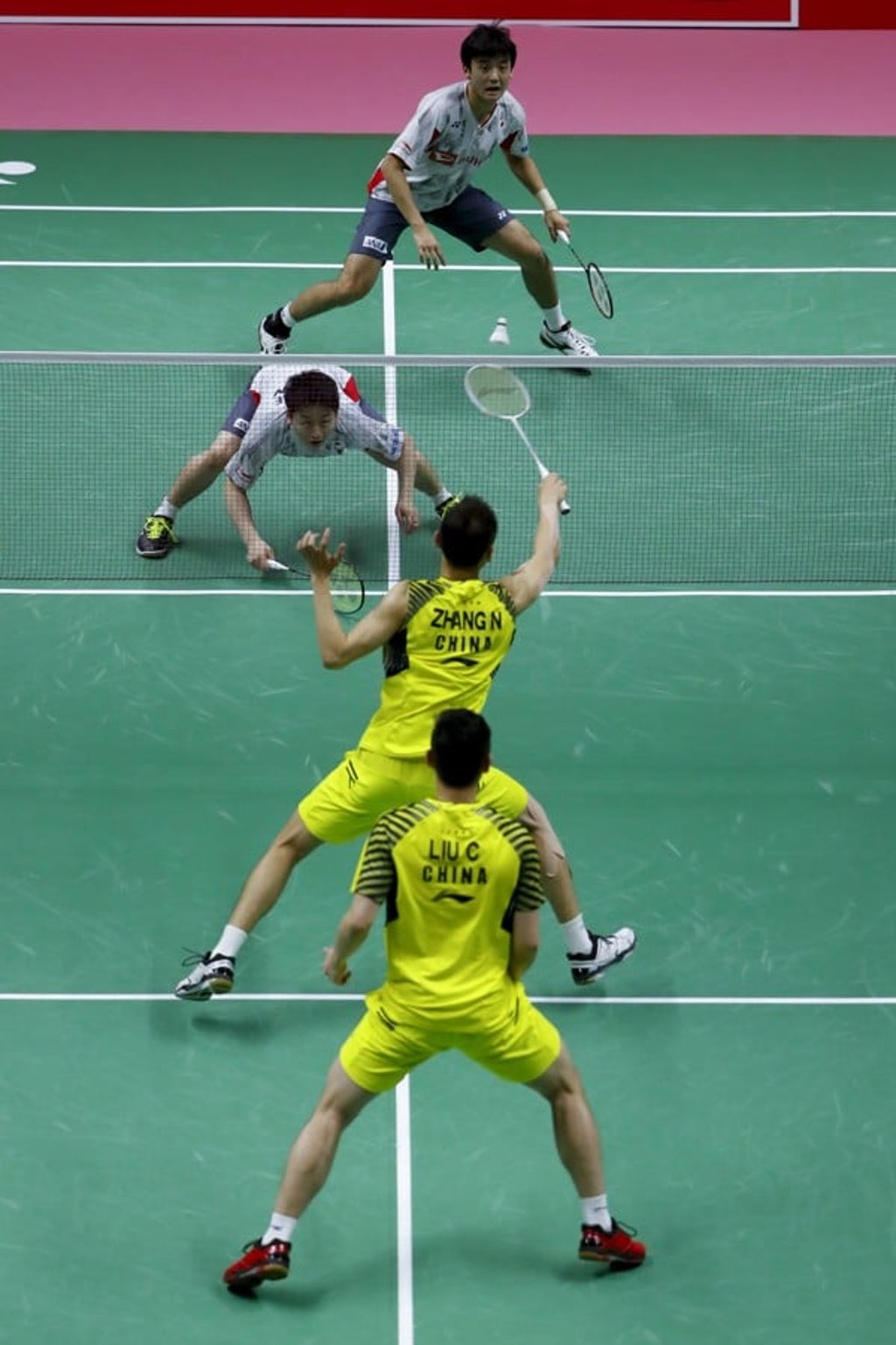 Japan’s Yuki Kaneko (top) and Takuto Inoue in action against China’s Liu Cheng and Zhang Nan during the 2018 Thomas Cup finals. Photo: EPA