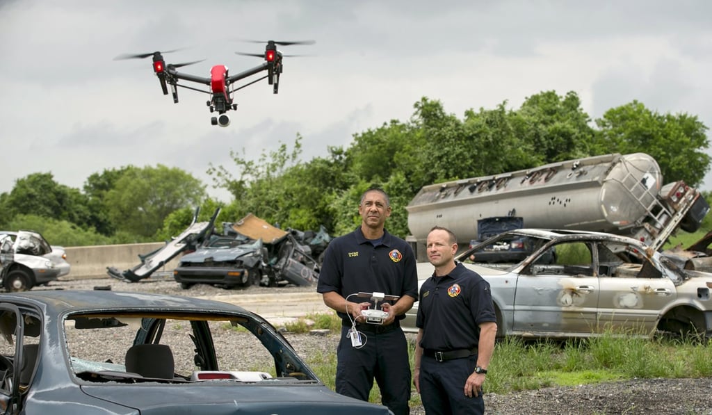Captain Greg Pope (left) and firefighter Coitt Kessler of the Austin (Texas) Fire Department demonstrate flying a DJI Inspire 1 drone at the department’s training academy in 2017. Photo: Austin American-Statesman via AP Captain Greg Pope (left) and firefighter Coitt Kessler of the Austin (Texas) Fire Department demonstrate flying a DJI Inspire 1 drone at the department’s training academy in 2017. Photo: Austin American-Statesman via AP