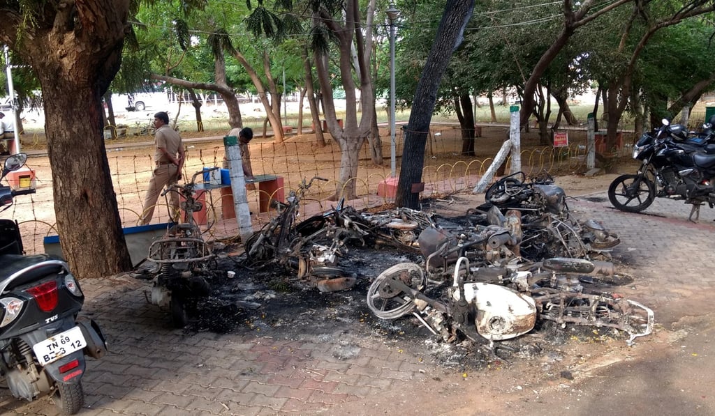Charred vehicles are pictured on May 24, after police fired on protesters seeking closure of plant on environmental grounds in the state of Tamil Nadu. Photo: Reuters