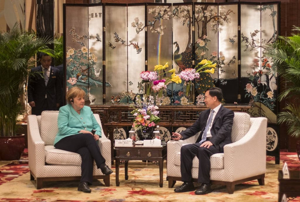 epGerman Chancellor Angela Merkel and Guangdong Party Secretary Li Xi talk during their meeting in Shenzen, China on May 25. Photo: EPA-EFE epGerman Chancellor Angela Merkel and Guangdong Party Secretary Li Xi talk during their meeting in Shenzen, China on May 25. Photo: EPA-EFE
