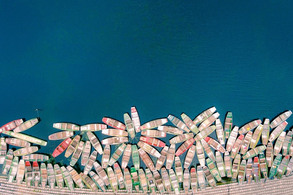 Boats in this photograph from Reyval’s Yellow Korner exhibition appear to form a geometric arrangement. Boats in this photograph from Reyval’s Yellow Korner exhibition appear to form a geometric arrangement.