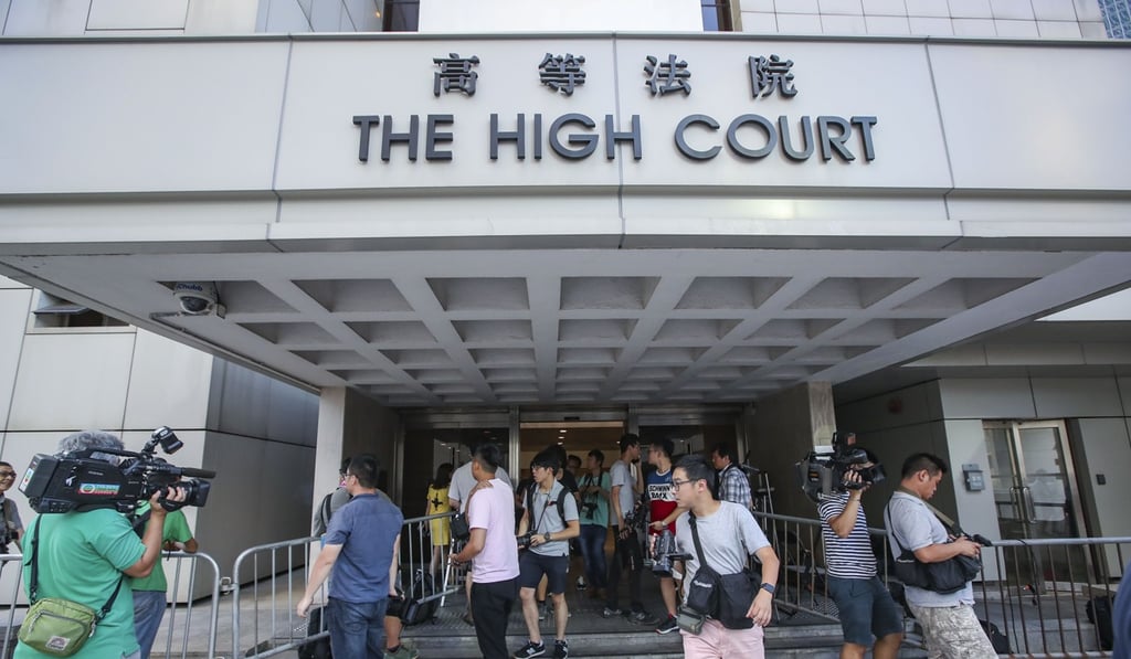 The High Court heard the woman had been spotted snapping photos while prosecutors were playing footage in support of their case. Photo: Edward Wong
