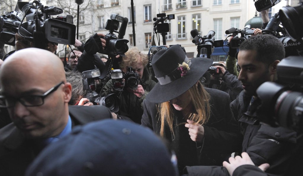 British designer John Galliano arriving at a Paris police station in 2011 for a face-to-face meeting with witnesses of his alleged anti-Semitic insults. Photo: AFP