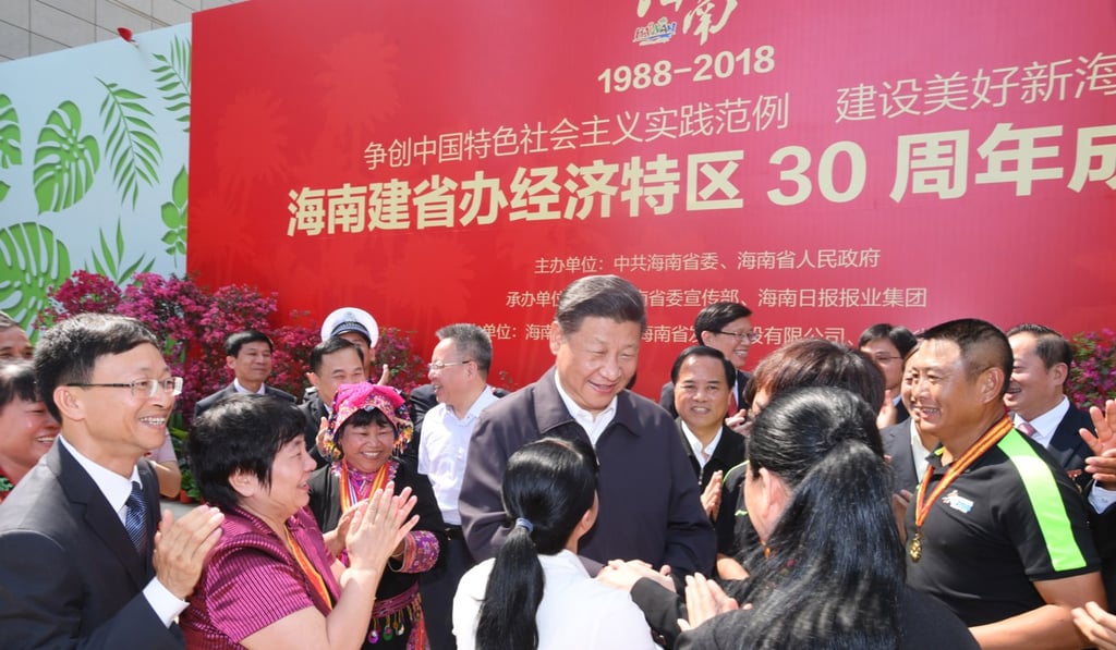 President Xi Jinping shakes hands with members of the public at a plaza near Hainan Museum in Haikou. Photo: Xinhua