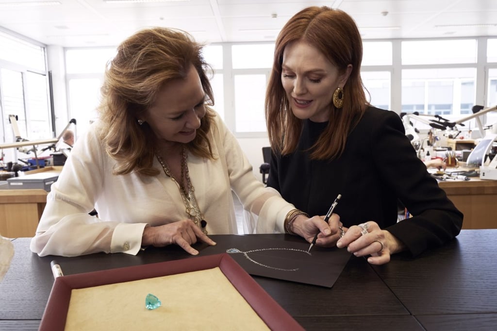 Caroline Scheufele and Julianne Moore working on the sketch of the necklace