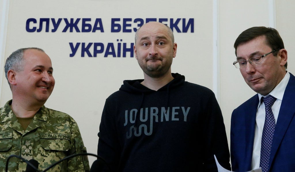 Russian journalist Arkady Babchenko (centre), turns up aliveat a press conference in the Ukrainian capital, Kiev, on Tuesday, with head of the state security service (SBU) Vasily Gritsak and Ukrainian Prosecutor General Yuriy Lutsenko. Photo: Reuters