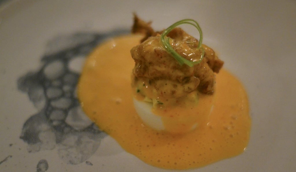 Devilled egg with tempura oyster. Photo: Chris Dwyer