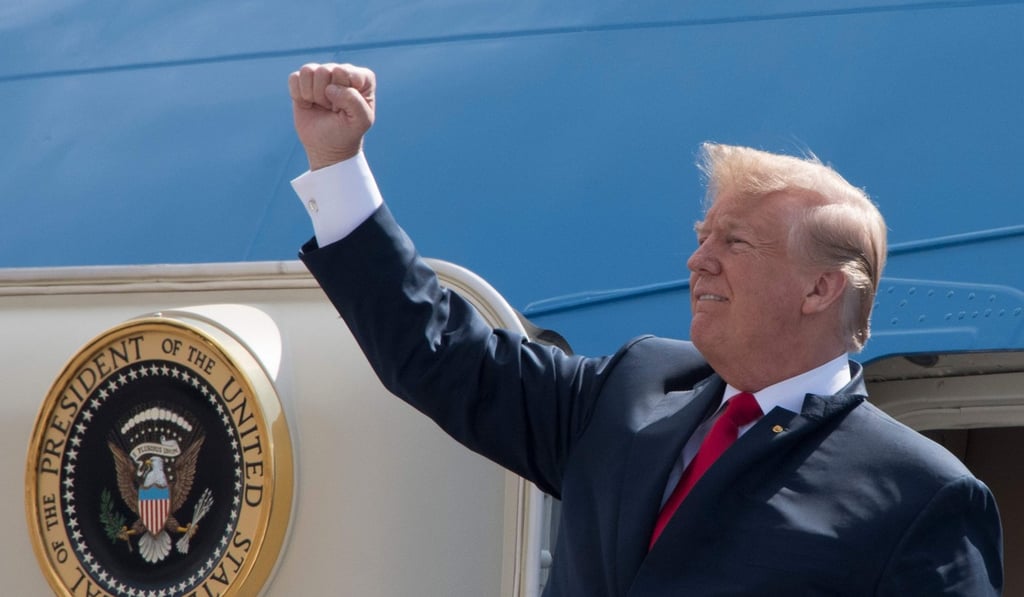 US President Donald Trump pumps his fist to the crowd as he arrives at Ellington Field Joint Reserve Base in Houston, Texas, on Thursday. Photo: AFP US President Donald Trump pumps his fist to the crowd as he arrives at Ellington Field Joint Reserve Base in Houston, Texas, on Thursday. Photo: AFP
