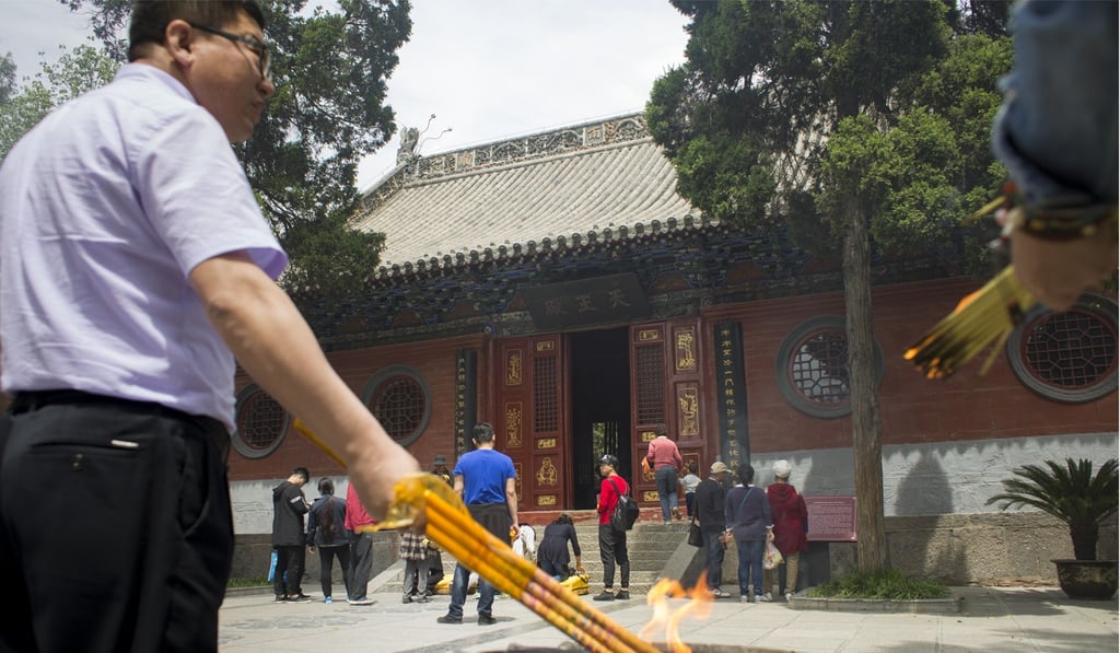 Tourists visit the White Horse Temple in Luoyang, Henan province, in April 2017. The temple, said to be the first Buddhist temple in China, was established by emperor Ming of the Han dynasty. Photo: May Tse