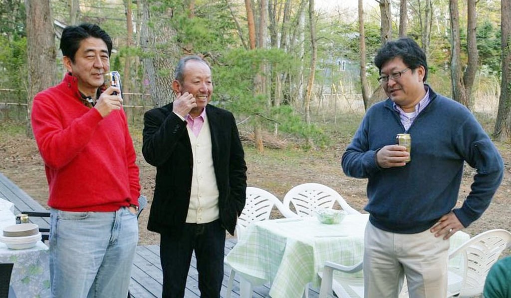 Koichi Hagiuda, right, with Japanese Prime Minister Shinzo Abe, left. Photo: Kyodo