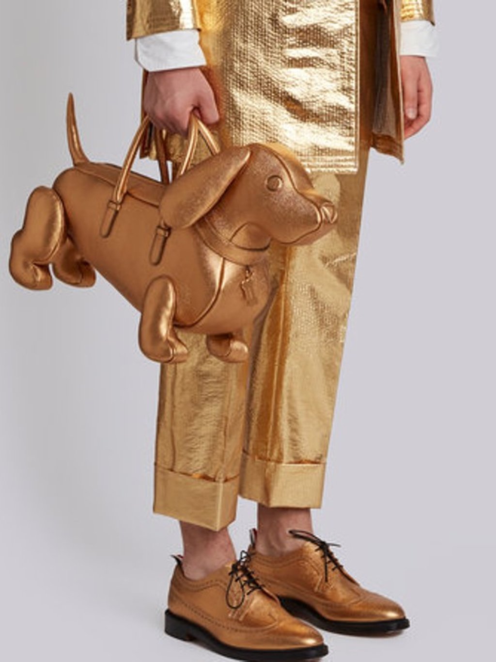 Hector the dachshund inspired a Thom Browne men’s purse. Hector the dachshund inspired a Thom Browne men’s purse.