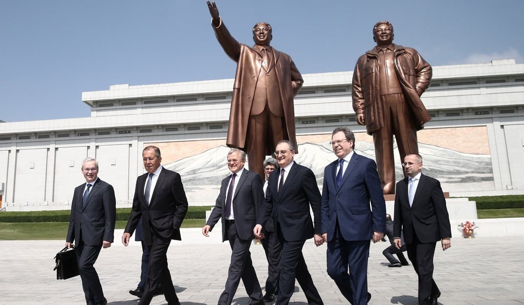Russian Foreign Minister Sergei Lavrov, second from left, with his delegation members walking after laying a wreath to the monument of Kim Il-sung in Pyongyang, North Korea on Thursday. Photo: EPA Russian Foreign Minister Sergei Lavrov, second from left, with his delegation members walking after laying a wreath to the monument of Kim Il-sung in Pyongyang, North Korea on Thursday. Photo: EPA