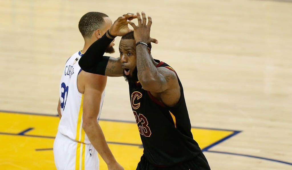 LeBron James reacts after a foul goes against him in game one of the NBA Finals. Photo: APF LeBron James reacts after a foul goes against him in game one of the NBA Finals. Photo: APF