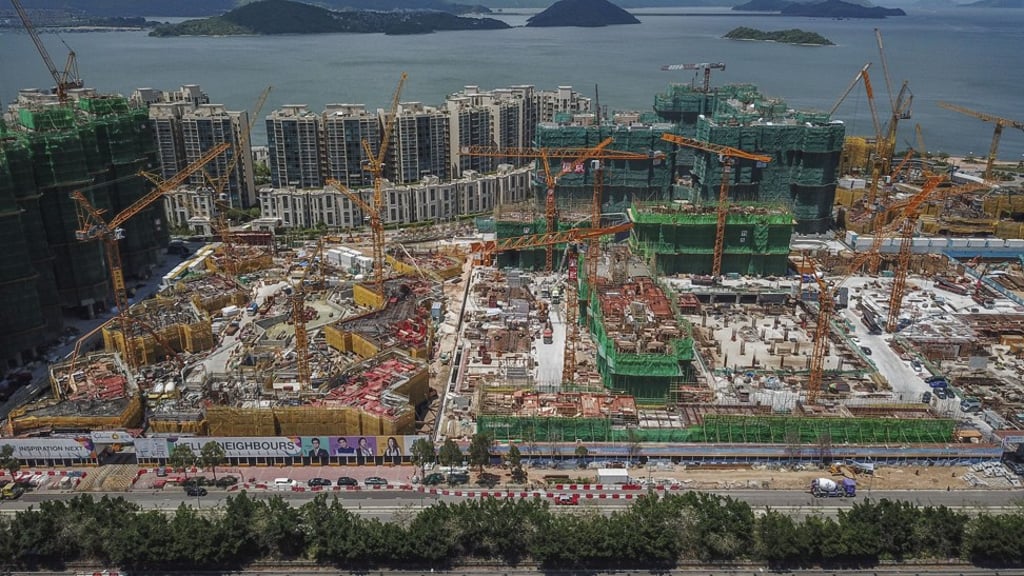 Aerial view of construction sites of Solaria by K. Wah Group (left in yellow borders) and Billion Development and Project Management Limited (right and back) by the Science Park in Sha Tin as of 25 May 2018. Photo: SCMP / Roy Issa