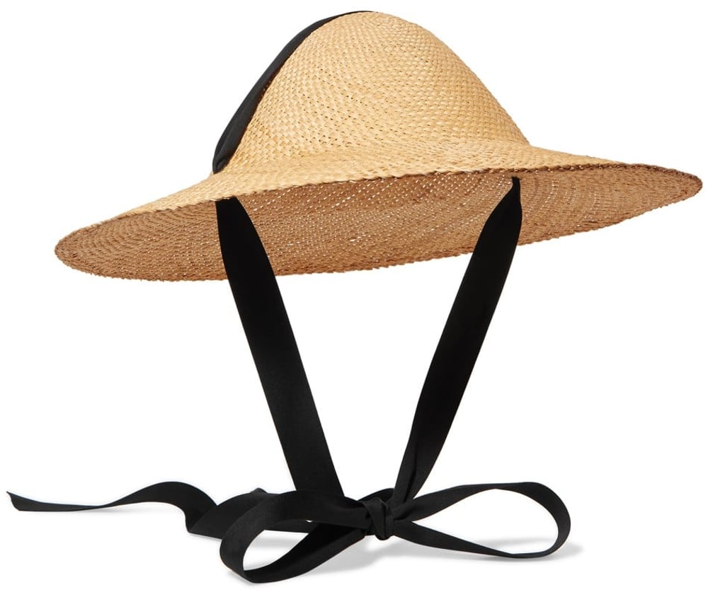 Cotton trimmed straw hat by Clyde from netaporter.com.