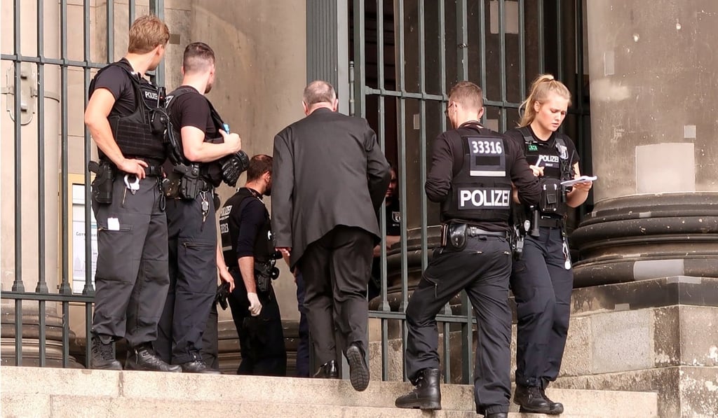 Police in front of the Berlin Cathedral. Officials said there was no evidence of a terrorist connection. Photo: Reuters