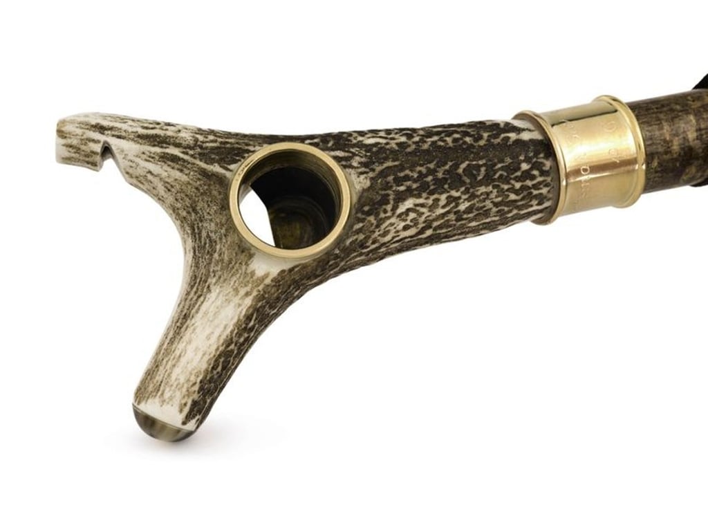 Lot 19: Huntsman Bespoke Stag Horn walking stick with brass cigar holder. Estimate: £400–£600 ($531–$796). Photo: Sotheby’s